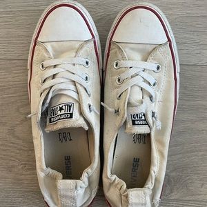 Well-loved white Converse low tops